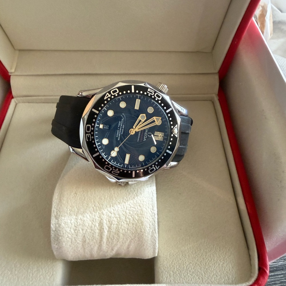 Omega Men's Black and Gold Dive Watch